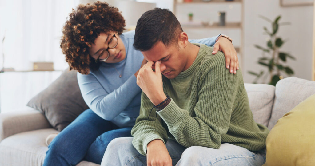 a wife supporting her husband during a discussion about personality disorder and addiction